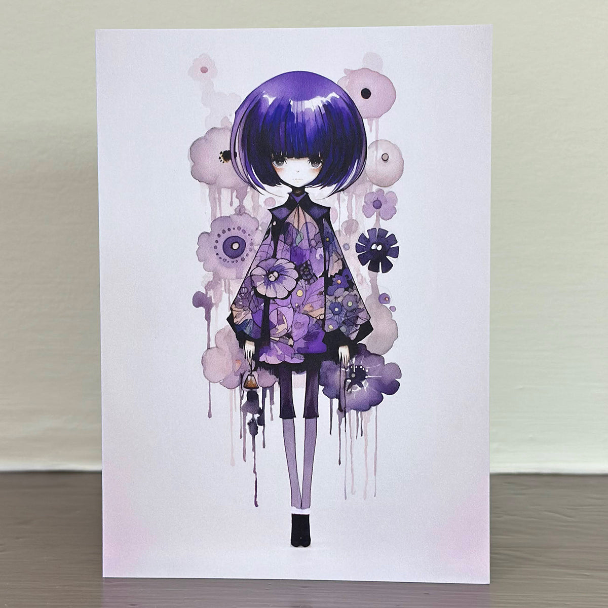 A Sweet Seasons greetings card, featuring a charming image of a girl in purple